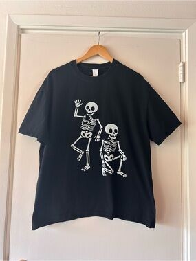 Black Tee with White Skeleton Ribs Graphic Political Statement